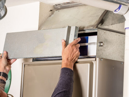 Removing furnace access cover for maintenance